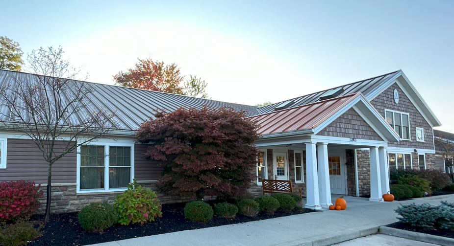 Exterior of the Young Explorers school, a century-old home, welcoming families with warmth and charm.