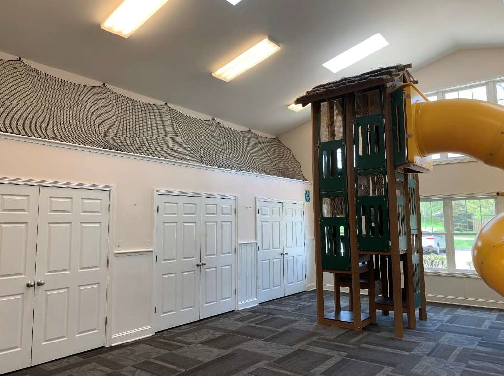 Cozy entrance of Young Explorers school, featuring the warmth of an original century home.